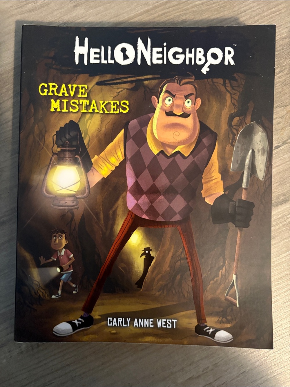 Scholastic Hello Neighbor Graphic Novel Back Cover - Black, Brown